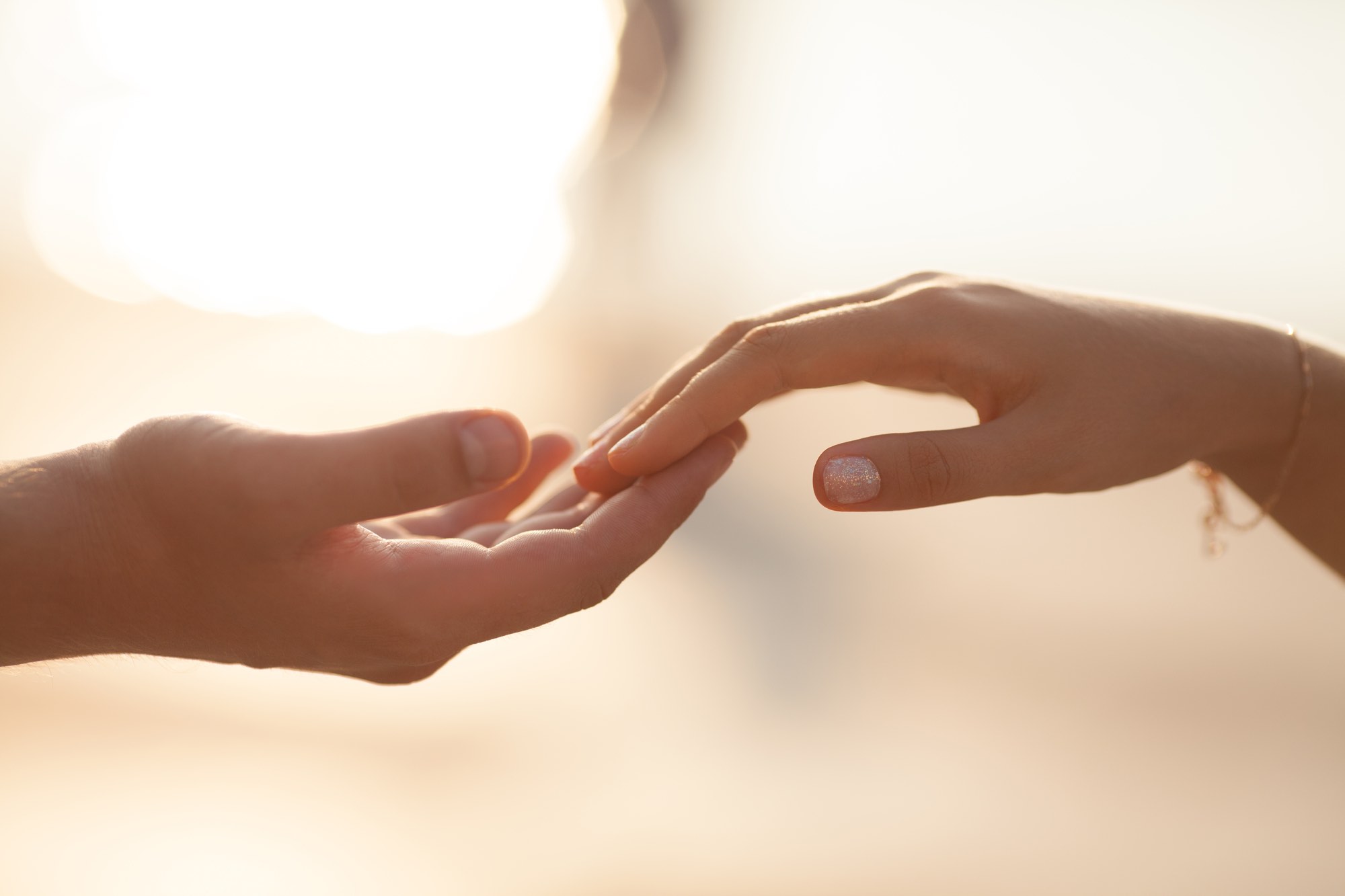 Valtina Health and Wellness Reiki Mindfulness Private Sessions - hands touching by the fingertips